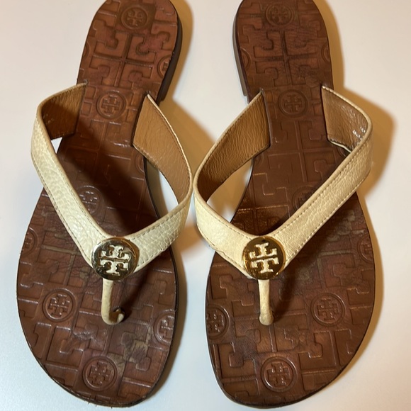 Tory Burch Shoes - Tory Burch flat sandals size 8 cream with gold logo. Leather upper